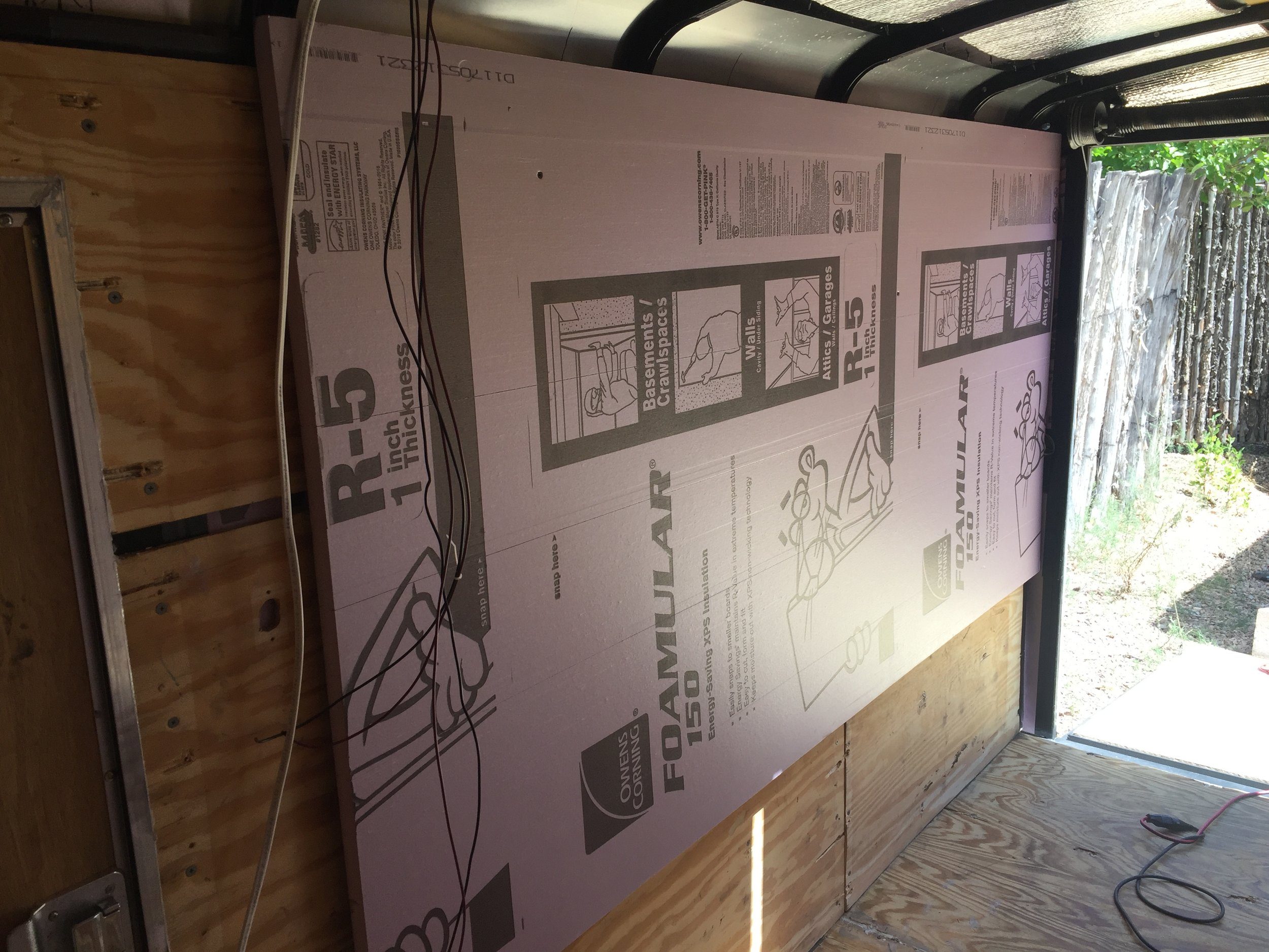 Inner layer of continuous insulation going in.