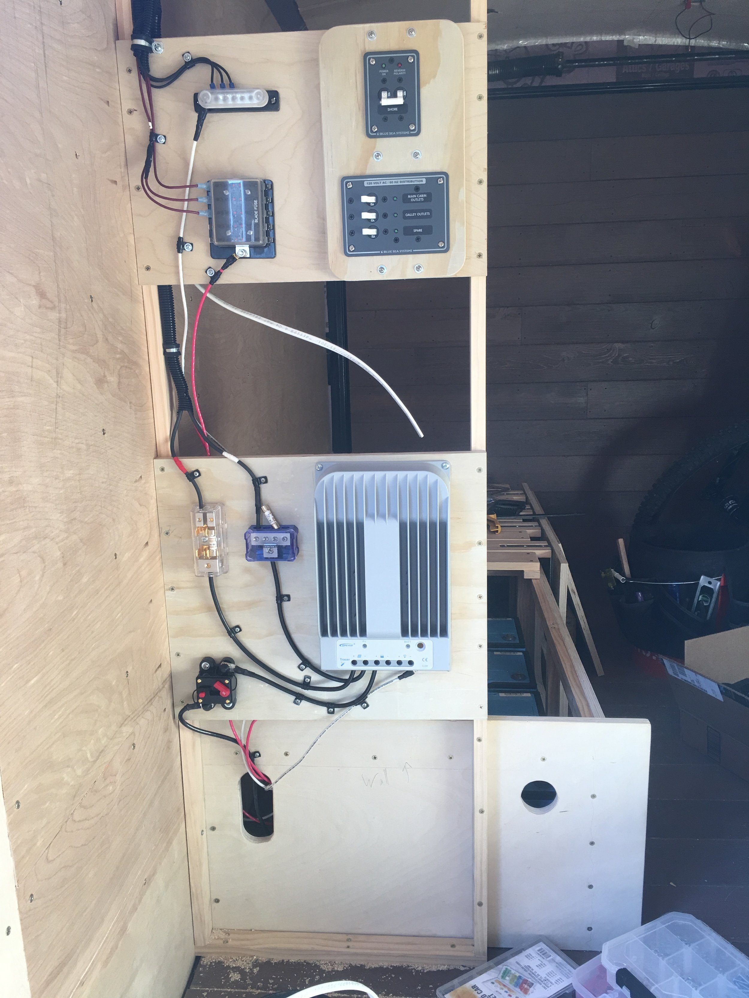 Solar charger, fuses, circuit breakers, etc. They’re all mounted on what is now the inside of my closet.