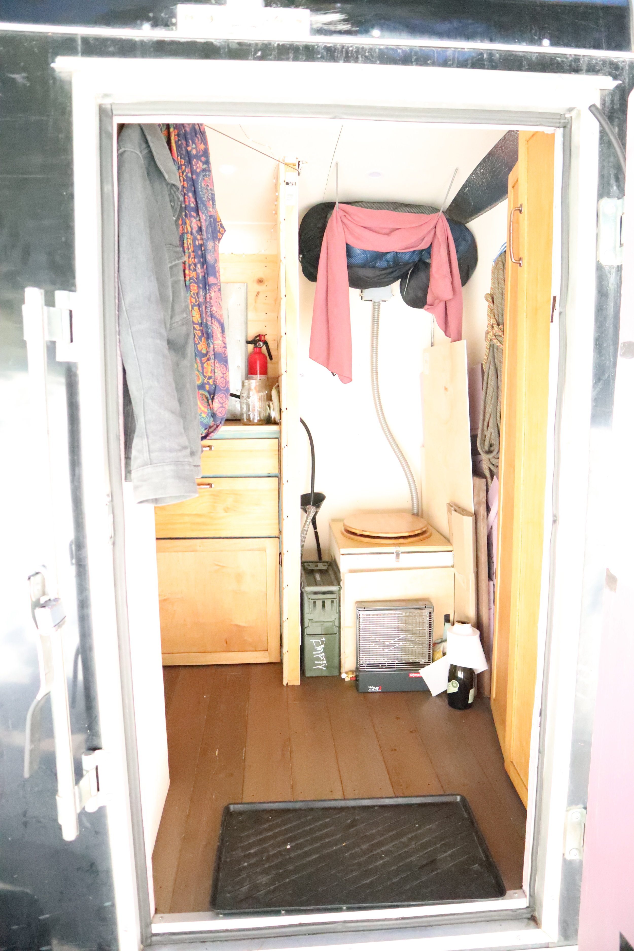 Coconut coir is in the ammo can to the left. The conduit is the “duct”, and the j-box has a small case fan in it that’s always on, pulling air from the cabin, through the toilet, and out the side wall vent.