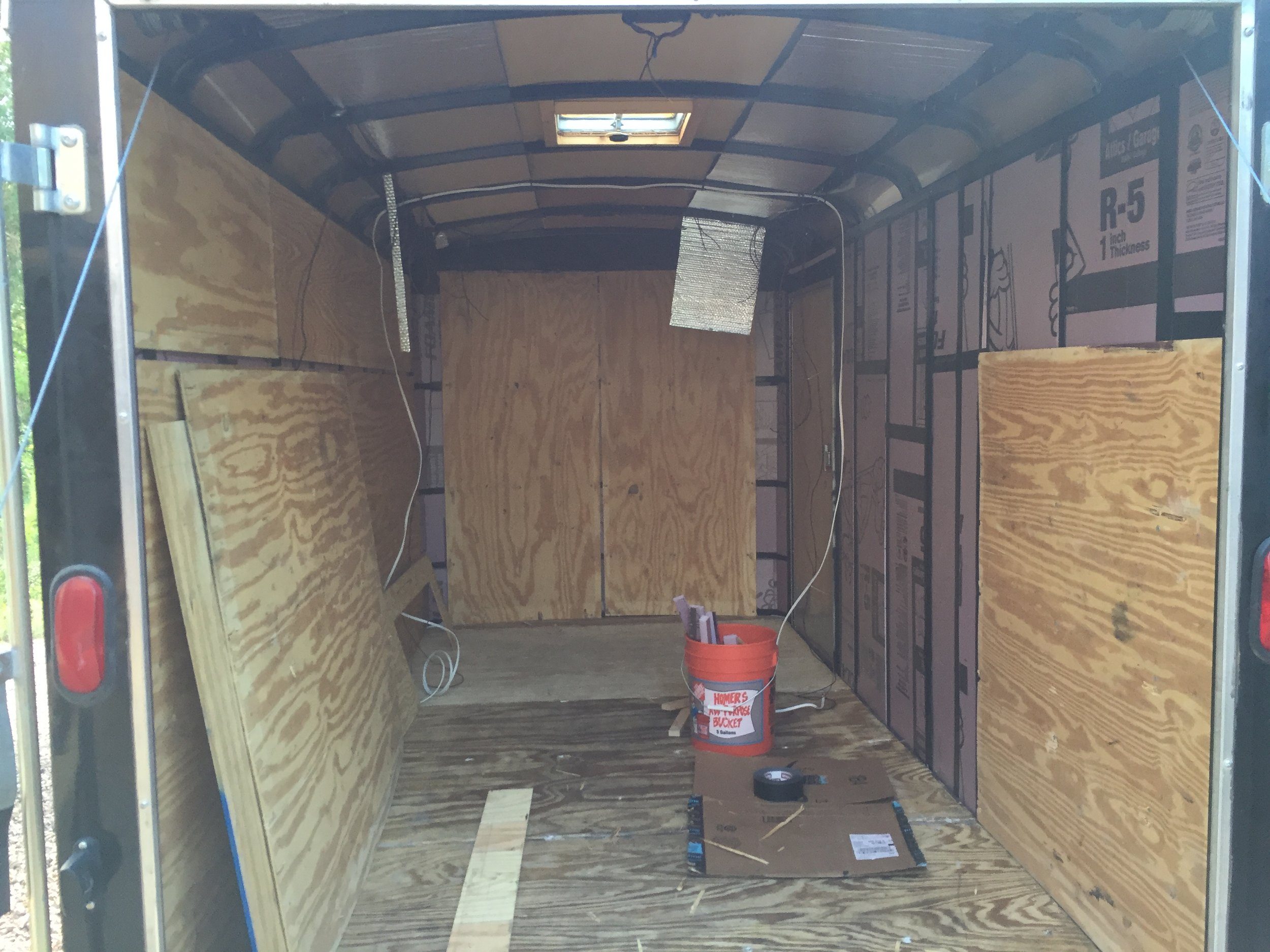 Original wall plywood going back in.