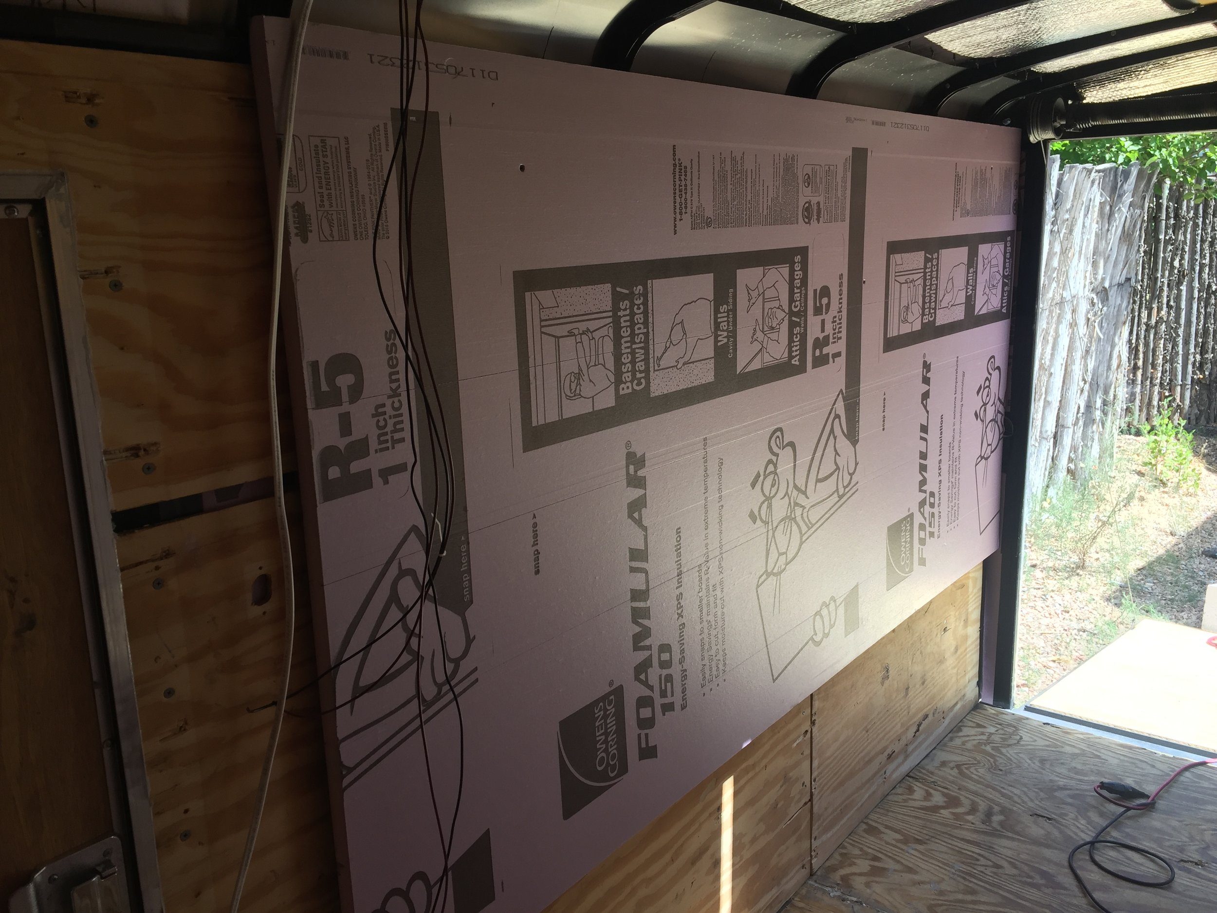 I first tacked a sheet of insulation up.