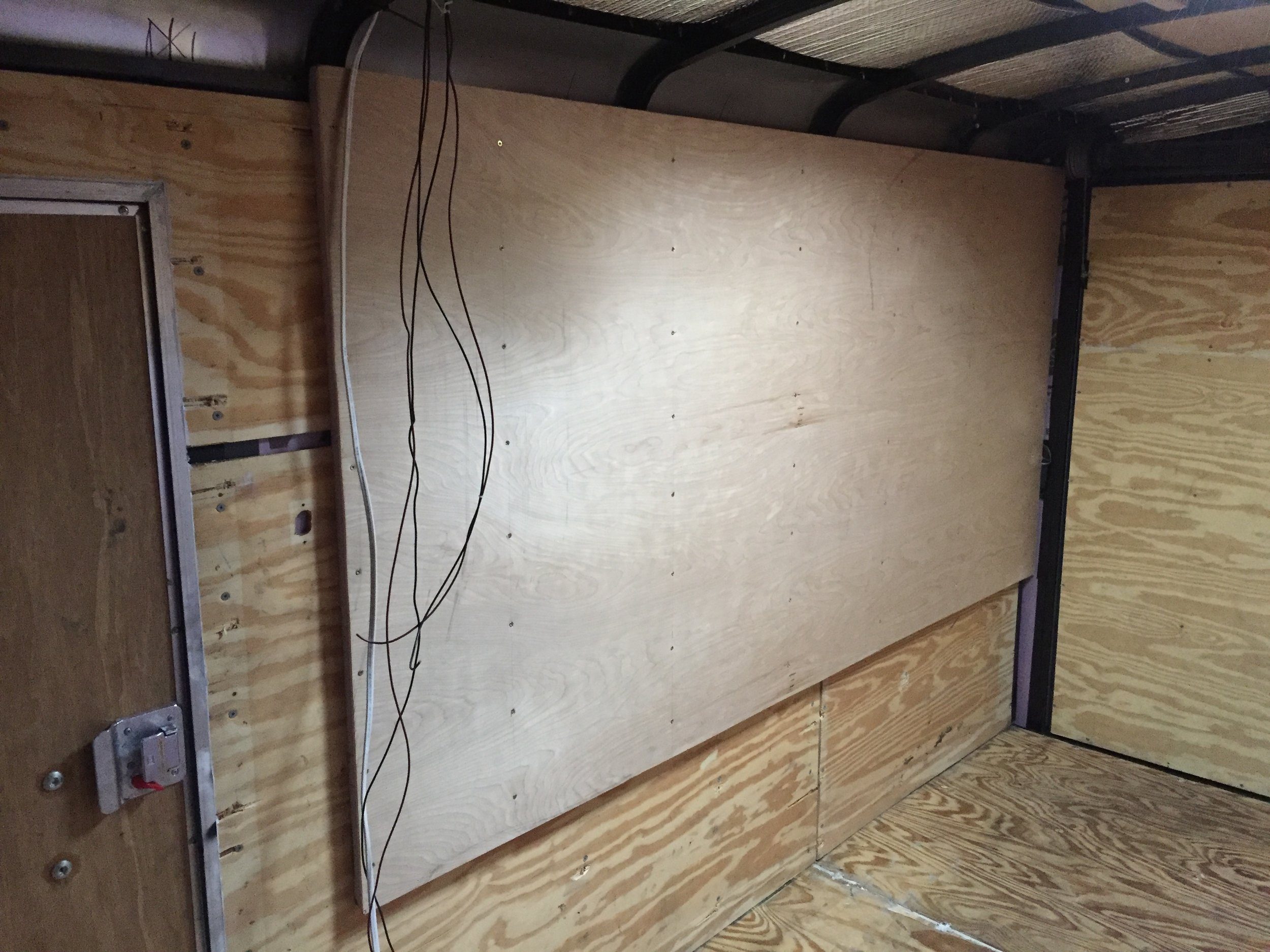 Then screwed in the 1/4” paneling on top, sandwiching the insulation.