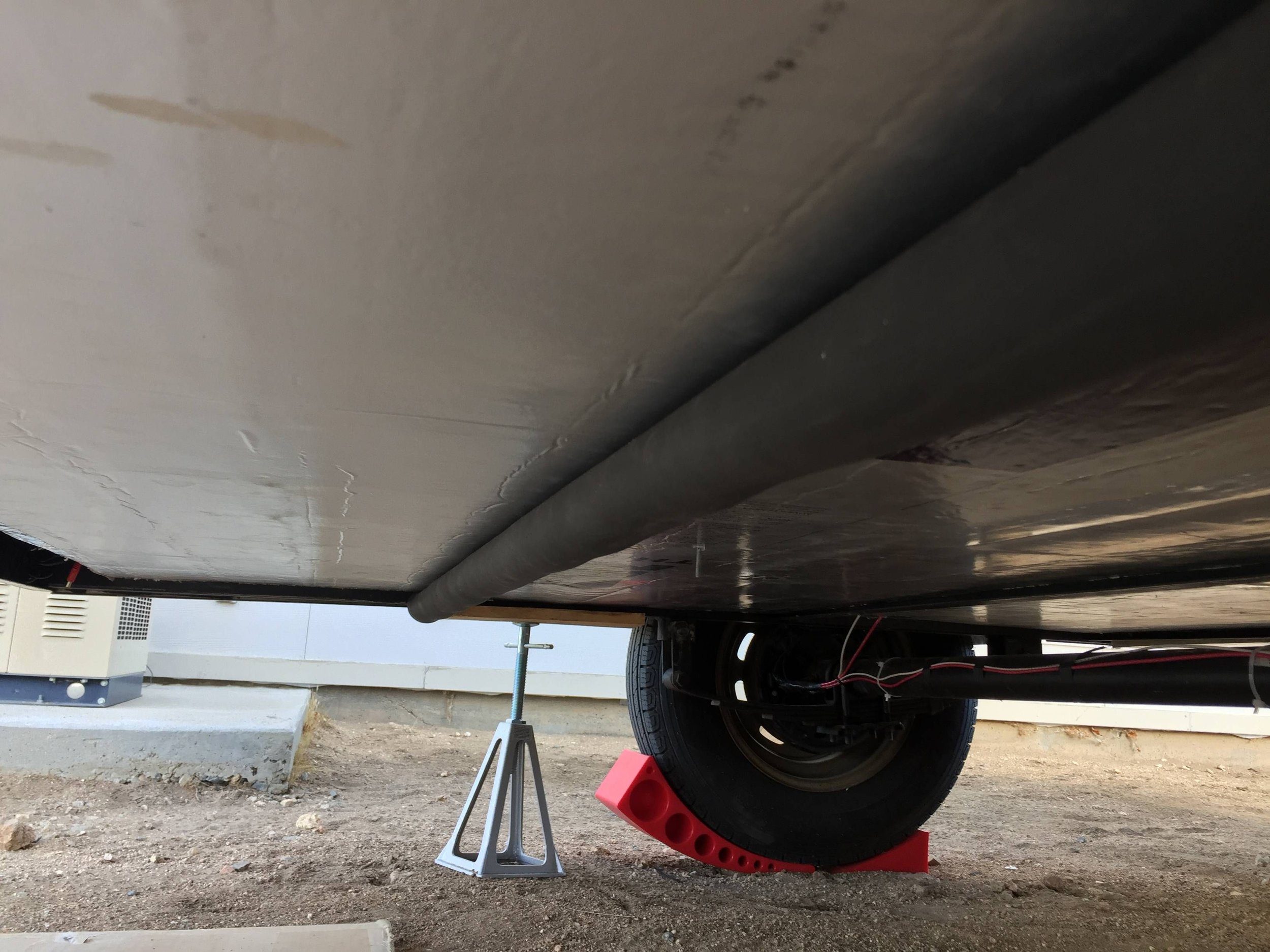 2” polyiso insulation with outdoor rated pipe insulation covering the z-channel floor joists, to mitigate thermal bridging.