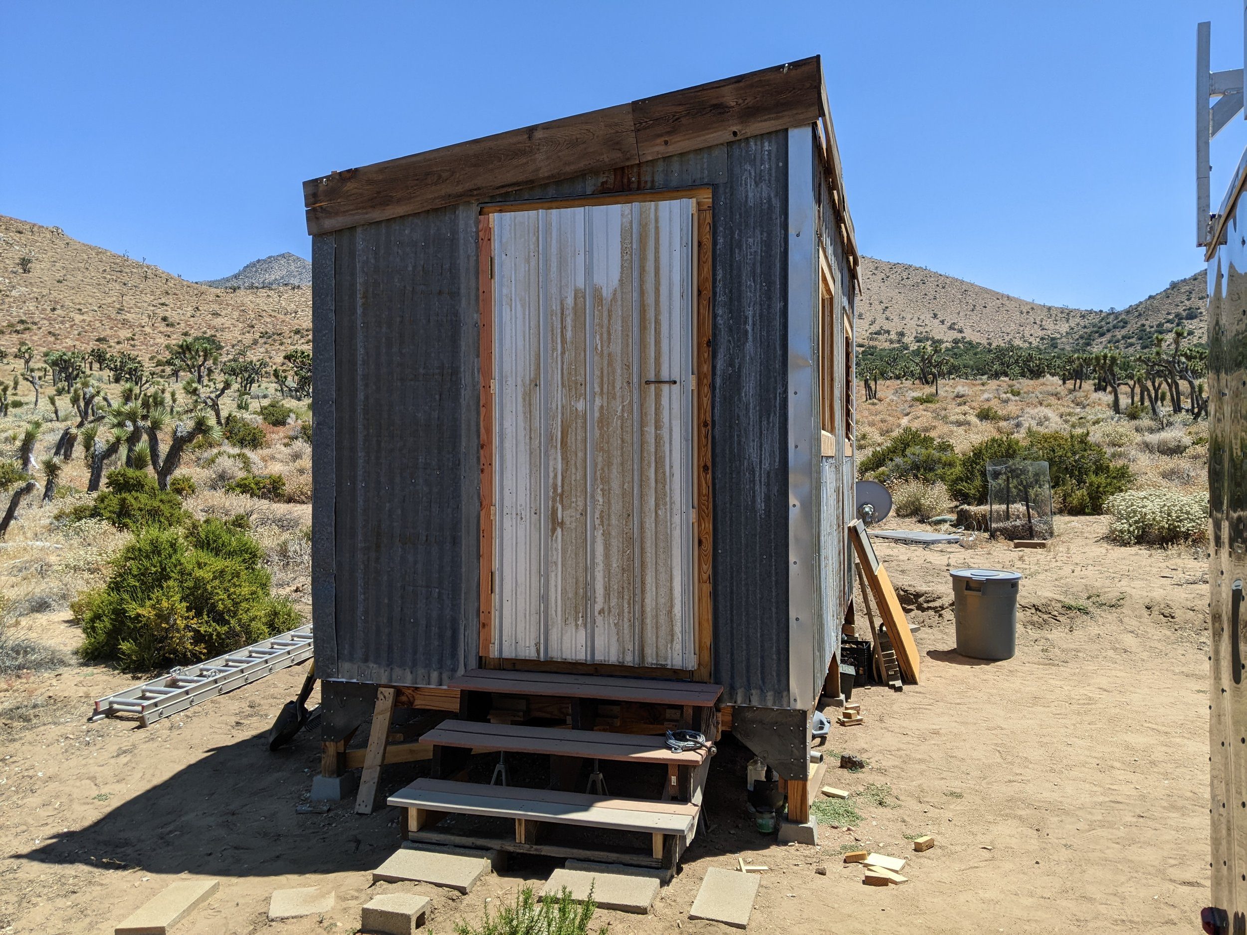 storm door on a tiny house in the mojave desert